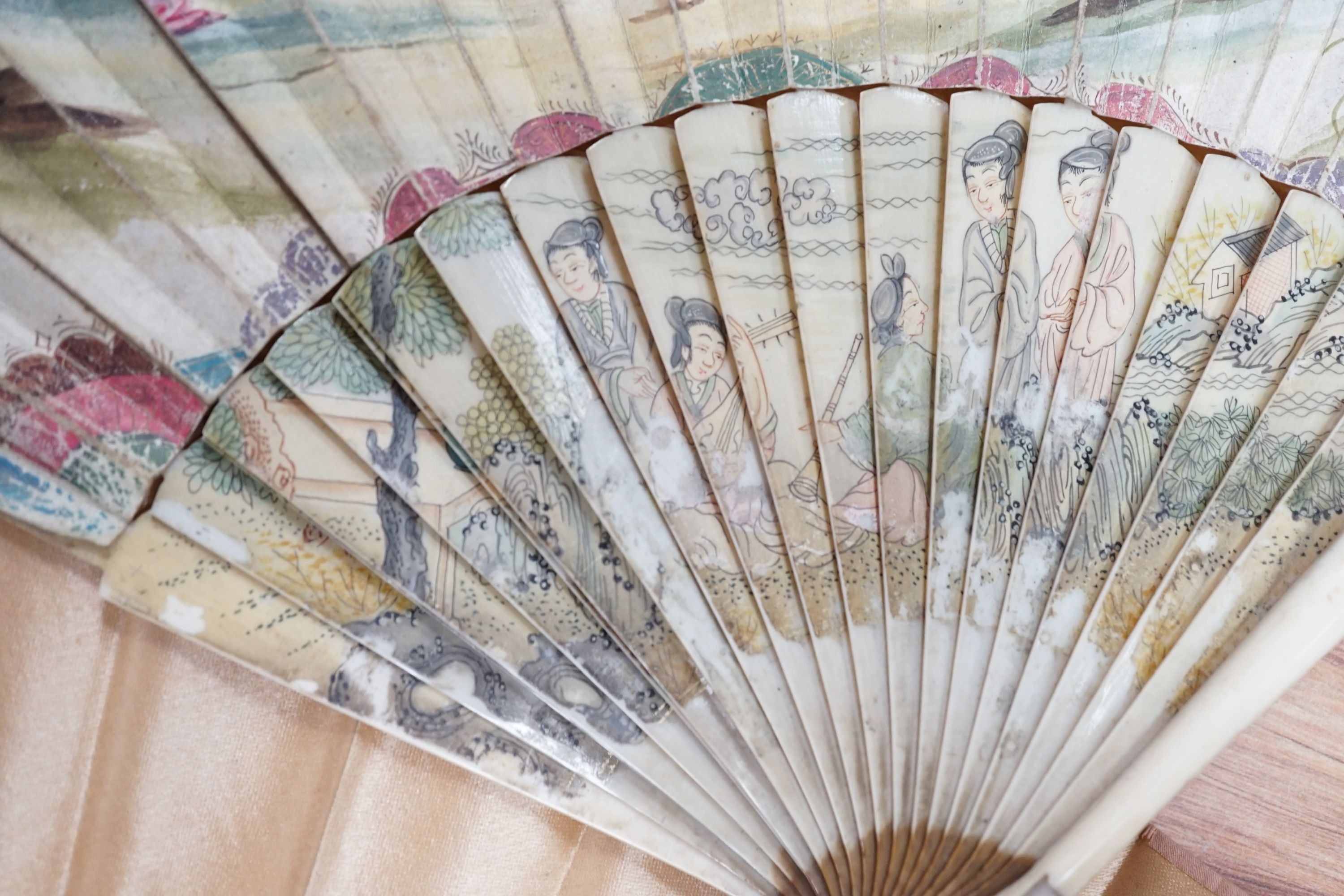 Five various fans, and an 18th century painted leaf fan with ivory chinoiserie decorated guards and sticks, 28 cms high (6)